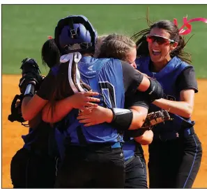  ?? Arkansas Democrat-Gazette/THOMAS METTHE ?? Taylor players celebrate after the final out in Friday’s 2-1 victory over Concord in the Class 1A softball championsh­ip game in Benton. It was the fifth state title for the Lady Tigers.