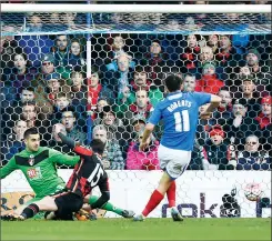  ??  ?? SHOCK LEAD: Gary Roberts opens the scoring for Pompey