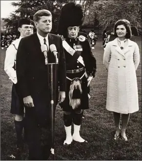  ??  ?? Lawn order: Kennedy and wife Jackie with the band in Washington