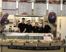  ??  ?? Bernadette Coletta pictured inside the cafe on her 60th birthday with members of the team