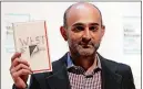  ?? KIRSTY WIGGLESWOR­TH/AP PHOTO ?? Author Mohsin Hamid appears at Conn College on Wednesday.