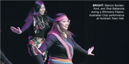  ??  ?? BRIGHT: Maricor Borden, front, and Shai Batiancila during a Wimmera Filipinoau­stralian Club performanc­e at Horsham Town Hall.