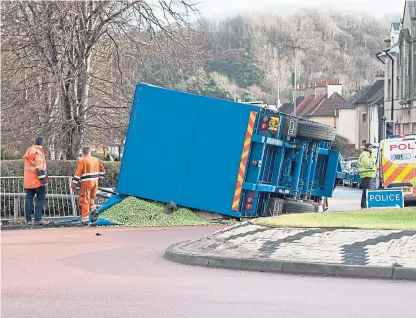  ?? Picture: Wullie Marr. ?? Hundreds of thousands of Brussels sprouts were strewn across Admiralty Road.