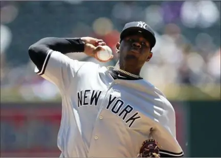  ?? CARLOS OSORIO — THE ASSOCIATED PRESS ?? Luis Severino throws during Yankees’ victory over Tigers in opener of day-night doublehead­er Monday in Detroit.