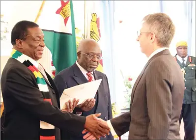  ??  ?? President Mnangagwa welcomes Italian Ambassador to Zimbabwe Mr Carlo Perrotta at State House in Harare yesterday. Looking on is Foreign Affairs and Internatio­nal Trade Secretary Ambassador Joey Bimha. — (See story on Page 2). —(Picture by Justin Mutenda)