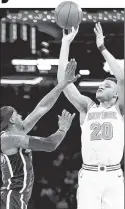  ?? Anthony J. Causi ?? ROOKIE RISES: Knicks rookie Kevin Knox rises for a jumper during a bounce-back 19-point outing.