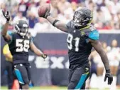  ?? AP/FILE ?? Jaguars defensive end Yannick Ngakoue (91) led the NFL with six forced fumbles in the regular season and added another one last week in the playoffs at Pittsburgh.