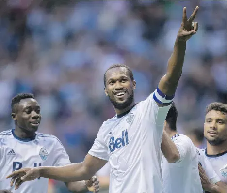  ?? THE CANADIAN PRESS FILES ?? Whitecaps captain Kendall Waston, centre, says the team’s success wouldn’t be possible without support from its fans.