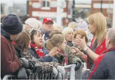  ??  ?? Louise in 2010 as Take That fans queued for tickets at the Stadium of Light.