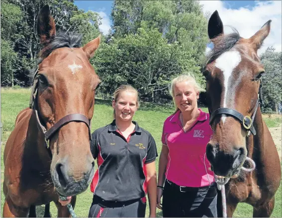  ??  ?? DOUBLE WIN: Ally, left, and Drew Carson both won their show jumping event at the Wairoa A&P Show.