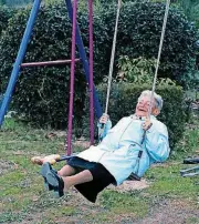  ?? MARY JO HOFFMAN] [PHOTOS PROVIDED BY ?? Twice a day, Lulu Peyraud takes 50 therapeuti­c swings on the swing set in her front yard in France.