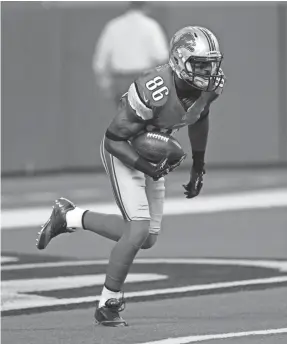  ?? PAUL SANCYA/AP ?? Lions wide receiver Nate Hughes returns a kick against the Bills in a 2012 NFL preseason game in Detroit.