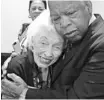  ?? JANIE HYDRICK ?? U.S. Rep. John Lewis hugs Jerry Emmett, 102, on Tuesday.