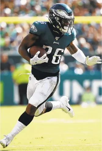  ?? MATT ROURKE/AP ?? Eagles running back Miles Sanders has to look for vertical openings more before deciding to run laterally.