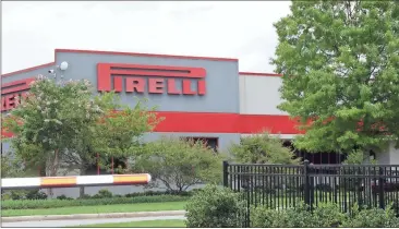  ?? File, Doug Walker / Rome News-Tribune ?? Pirelli Tire North America, located in the Floyd County Industrial Park. has used Georgia Quick Start training a couple of time since it first opened in Rome. The plant is one of the most heavily robotized plants in the Rome area.