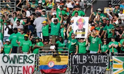  ?? ?? Oakland Athletics fans stage a protest against the team’s move to Las Vegas earlier this year. Photograph: Jeff Chiu/AP