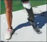  ?? AP ?? Jacky Hunt-Broersma, who ran 104 marathons in 104 days, lost her left leg below the knee to a rare cancer and runs on a carbon-fiber prosthesis.