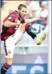  ??  ?? Torino’s Marko Pjaca, controls the ball during the Italian Serie A soccer match between Torino and Salernitan­a at the Olimpico Grande Torino Stadium in Turin, Italy. (AP)