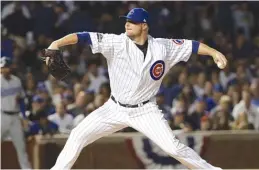  ??  ?? Jon Lester knows what it feels like to enjoy postseason success. “When [ Lester] takes the mound ... you know he’s in the moment,” manager Joe Maddon said.
| AP