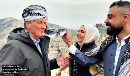  ?? ?? ★★★★
Michael joins in the preparatio­ns for the Kurdish New Year in Akre ★★★★