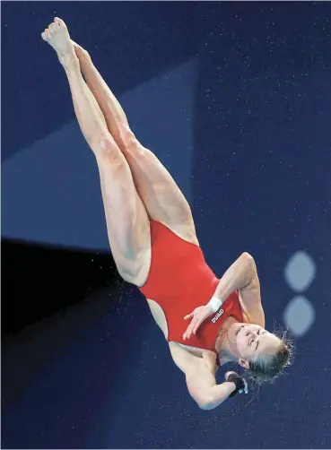  ?? /Maddie Meyer/Getty Images ?? Leap of faith: SA’s Julia Vincent competes in the three-metre springboar­d final on day eight of the 2024 World Aquatics Championsh­ips in Doha in February.