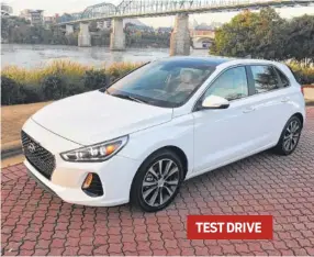  ?? STAFF PHOTO BY MARK KENNEDY ?? The 2018 Hyundai Elantra GT is a sporty hatchback with ample interior room. TEST DRIVE