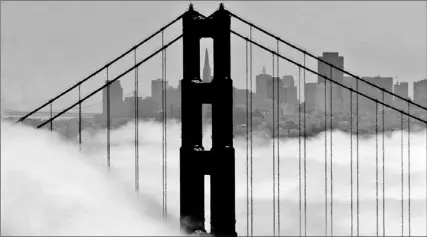  ?? PAUL SAKUMA/ AP ?? Free WiFi Web could be zapping across hilly, foggy San Francisco if Google plan goes ahead. As with the search engine, ads would pay the bills.