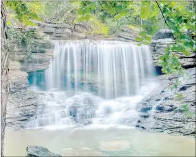  ?? Photo courtesy of Dana Johnson ?? One of Johnson’s photos captures the Lake Ann waterfall after a rain, using a long exposure to get the white, misty effect.