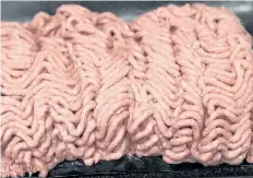  ?? THE ASSOCIATED PRESS FILES ?? This 2012 file photo, shows the beef product that critics call “pink slime” during a plant tour of Beef Products Inc. in South Sioux City, Neb. Beef Products Inc. says the settlement reached with ABC in a $1.9 billion defamation lawsuit over the...