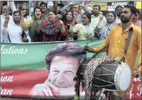  ?? PICTURE: AP/AFRICAN NEWS AGENCY (ANA) ?? Supporters of Pakistan Tahreek-e-Insaf party headed by Imran Khan celebrate in Lahore, Pakistan, on Saturday.