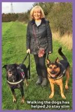  ??  ?? Walking the dogs has helped Jo stay slim