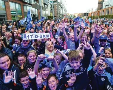  ??  ?? Crowds: Dublin supporters at the homecoming in Smithfield Square in Dublin city