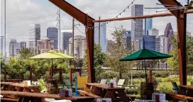  ?? Staff file photo ?? Saint Arnold Brewing Company previews its beer garden and restaurant on July 18, 2018, at 2000 Lyons in Houston.