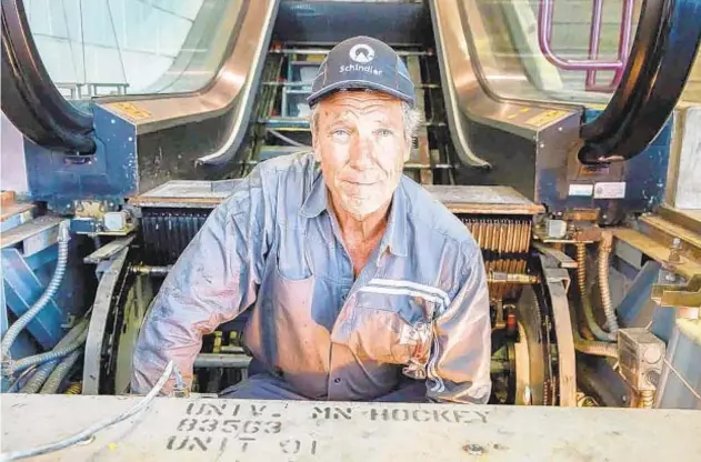  ?? SCHOOL OF HUMANS/DISCOVERY ?? Host Mike Rowe finds himself inside an escalator pit in the new version of “Dirty Jobs.”