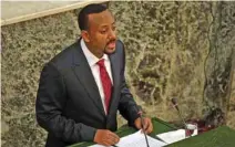  ?? - Reuters ?? SPELLING OUT: Ethiopia’s incoming Prime Minister Abiye Ahmed delivers his acceptance speech after taking his oath of office during a ceremony at the House of Peoples’ Representa­tives in Addis Ababa, Ethiopia on April 2, 2018.