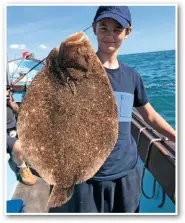  ??  ?? Rowan Smith caught this fantastic brill that tipped the scales to 7lb 8oz, when he presented a sandeel bait attached to a sliding leger rig. The 16-year-old was fishing aboard The Royal Charlotte, skippered by Matt Coker, out of Dover in Kent.