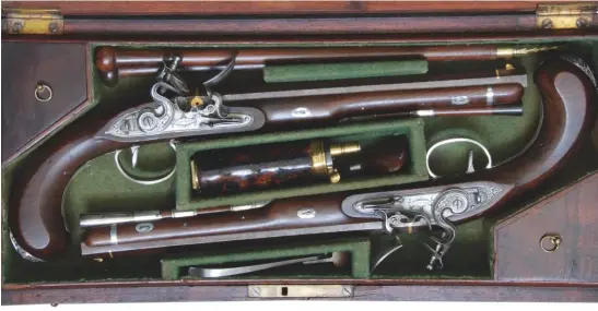  ??  ?? These pistols from the National Maritime Museum are engraved ‘Horatio Nelson 1780’. Research suggests the attributio­n is spurious, though the quality is superb