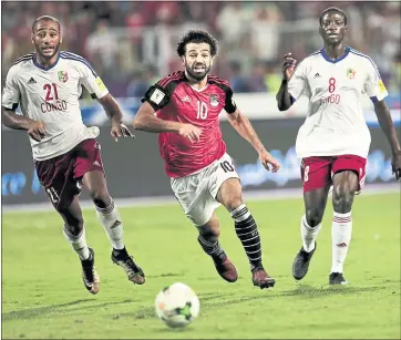  ?? NARIMAN EL-MOFTY — THE ASSOCIATED PRESS ?? High-scoring Egyptian striker Mohamed Salah, center, could be one of the breakout stars of this year’s World Cup in Russia.