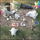  ??  ?? Amy Gorton, 25, and partner Lewis Hanlon, 26, from Hinckley, with their four children, Isabelle, Alice, Harry and George (right). The couple were heartbroke­n after their baby’s grave was damaged in Ashby Road Cemetery (left)