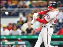  ?? (AP) ?? Washington Nationals starting pitcher Patrick Corbin hits an RBI double during the eighth inning against the Pittsburgh Pirates in a baseball game
on Aug 21 in Pittsburgh.