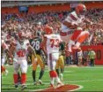  ?? TIM PHILLIS — THE NEWS-HERALD ?? Browns quarterbac­k DeShone Kizer celebrates his touchdown run against the Steelers on Sept. 10.