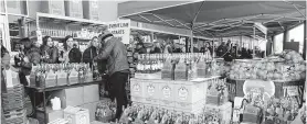  ?? Photos by Craig Moseley / Staff photograph­er ?? Hundreds lined up, some hours ahead, to purchase bottles of Vanderpump Rosé and get an autograph from Lisa Vanderpump at the Grand Parkway H-E-B in Katy.