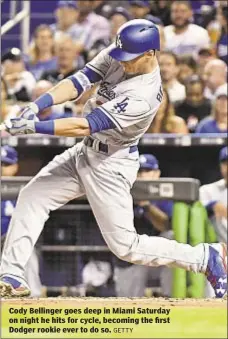  ?? GETTY ?? Cody Bellinger goes deep in Miami Saturday on night he hits for cycle, becoming the first Dodger rookie ever to do so.