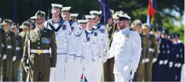  ?? Associated Press ?? An honour guard is formed at Defence Headquarte­rs in Canberra on Thursday.