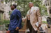  ?? GENE J. PUSKAR / AP ?? Bill Cosby (right) leaves after attending jury selection in his sexual assault case at the Allegheny County Courthouse on Monday in Pittsburgh.