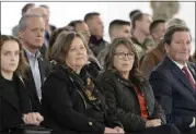  ?? ?? Vacaville Mayor, John Carli (left) and United States Congressma­n, John Garamendi (D-Solano) (right) listen as Travis Air Force Base Commander, Col. Derek M. Salmi delivers his State of the Base address. Carli and Garamendi were among several local and federal government officials in attendance Thursday in Fairfield.