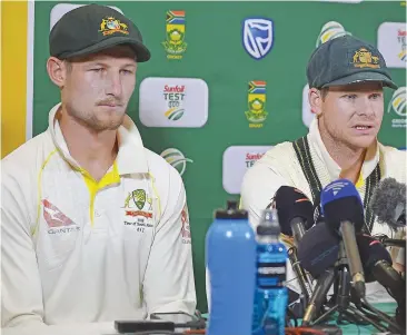  ?? Photo: Sydney Morning Herald ?? From left: Australia cricket fielder Cameron Bancroft and captain Steve Smith are being grilled by the media in Newlands, South Africa on March 24, 2018.