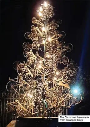  ??  ?? The Christmas tree made from scrapped bikes