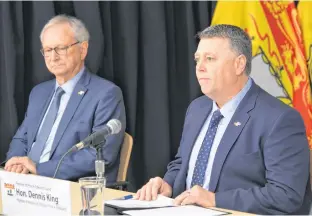  ?? TERRENCE MCEACHERN • SALTWIRE NETWORK ?? Premier Dennis King, right, and New Brunswick Premier Blaine Higgs address the media during a Feb. 20 press conference after the Council of Atlantic Premiers met in Charlottet­own.