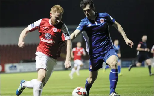  ??  ?? Rovers’ Chris Kenny battles with Lee Desmond of St. Patrick’s Athletic. Pics: Carl Brennan.